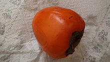 A ripe hachiya persimmon fruit